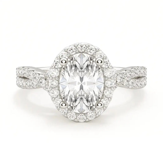 Diamond ring with a halo on a white background