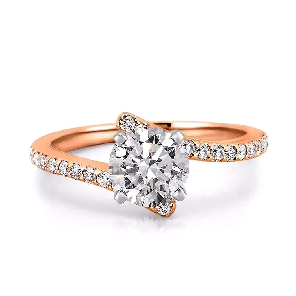 Rose gold ring with a large diamond and smaller diamonds on the band against a white background