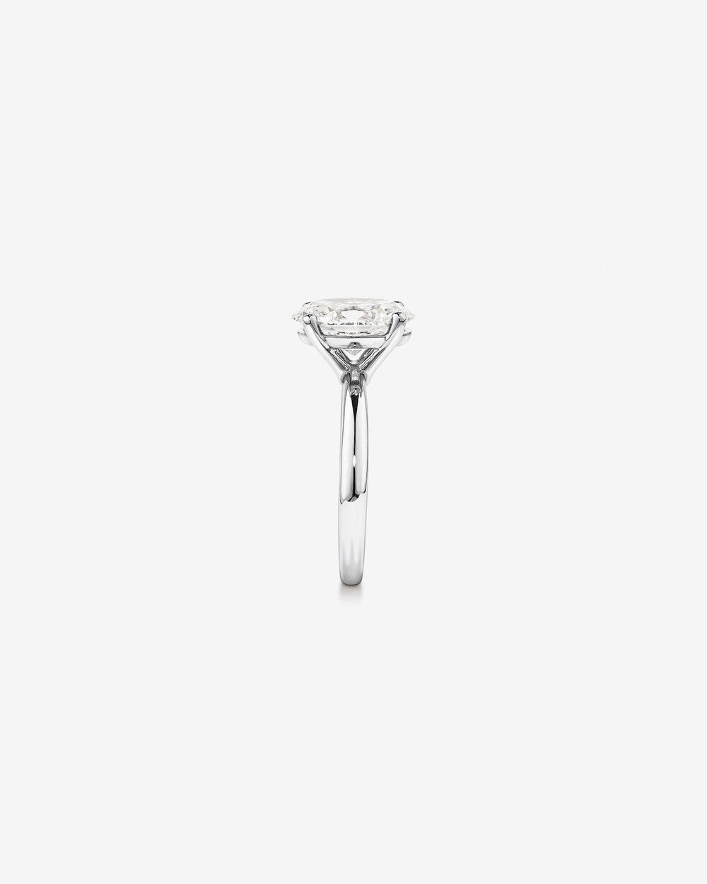 3 carat diamond ring on a white background side view