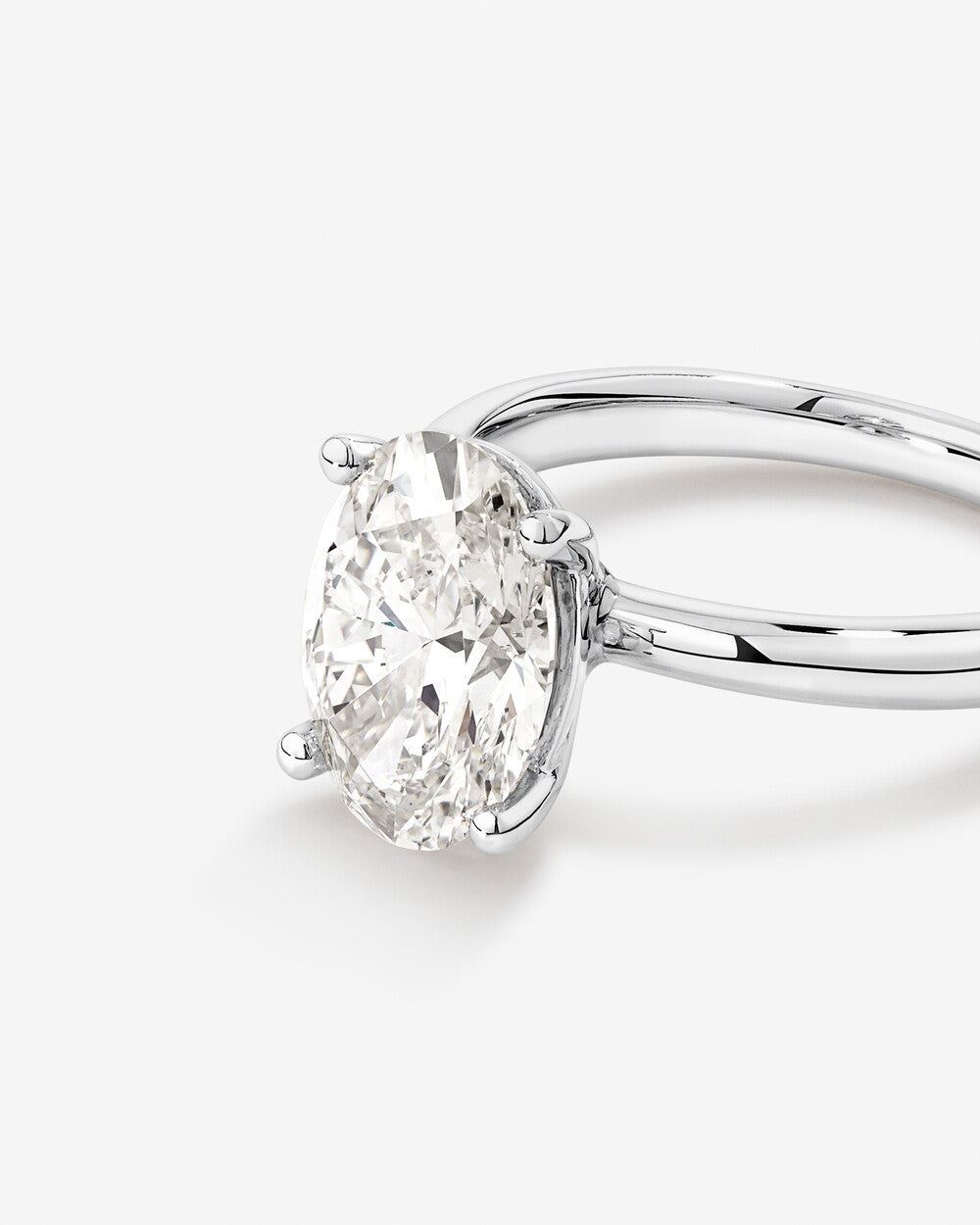 3 carat diamond ring on a white background side view