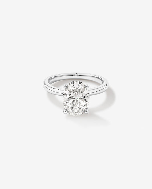 3 carat diamond ring on a white background side view