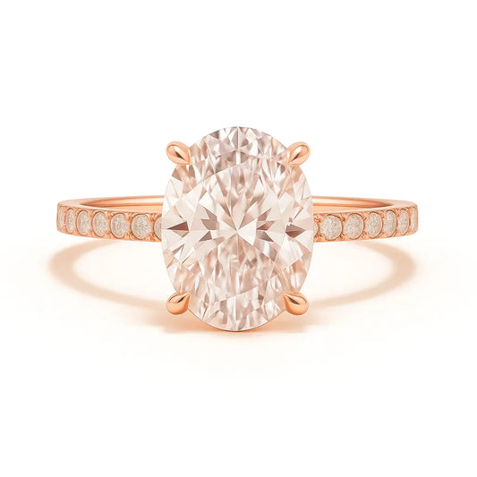 Rose gold ring with a large diamond and smaller diamonds on the band against a white background