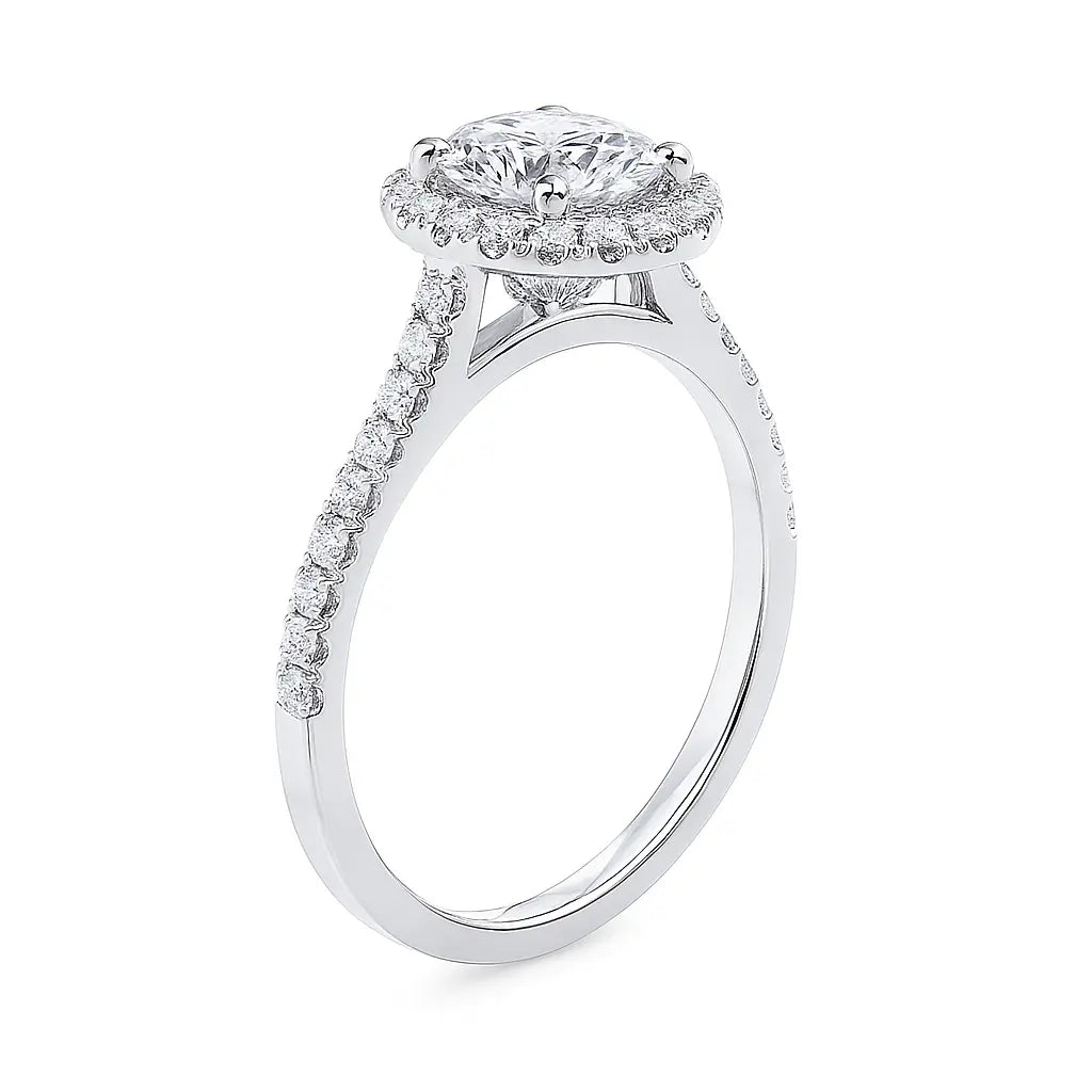 Diamond ring with a halo and side stones on a white background by Future Jewelry