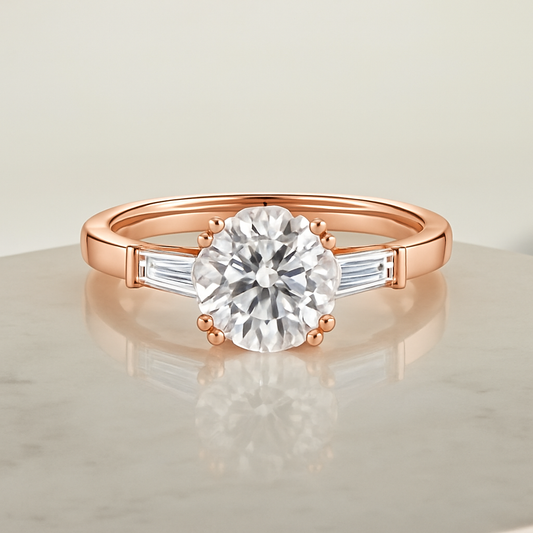Rose gold ring with a diamond on a reflective surface