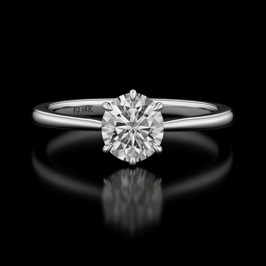 Diamond ring with '14K' marking on a black background