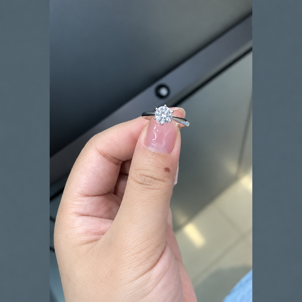 18K White Gold Round Brilliant Cut Lab Grown Diamond Eternity Ring in white gold held in hand - Future Jewelry