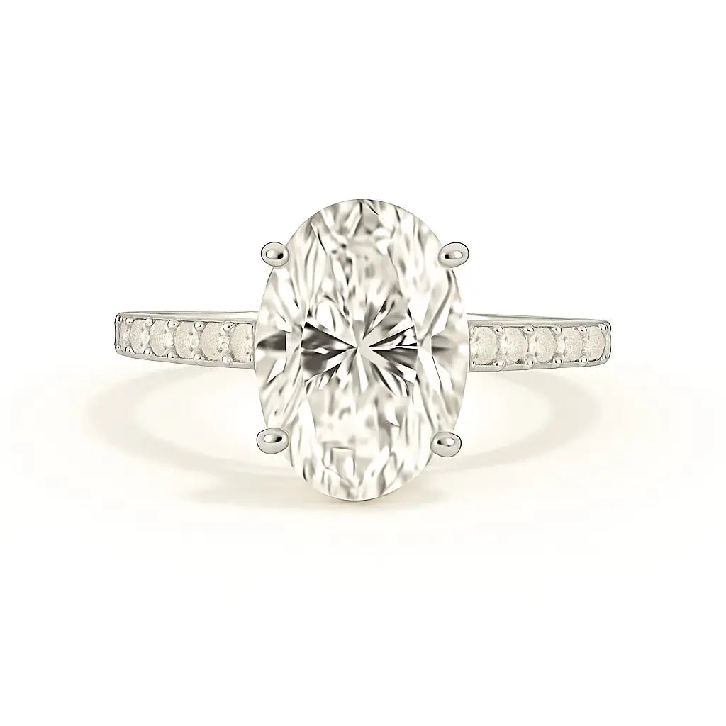 Diamond ring with a large central gemstone and smaller stones on the band against a white background