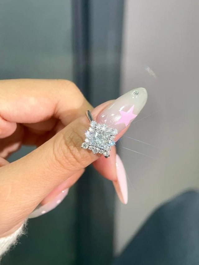 Lab grown diamond ring on a finger 