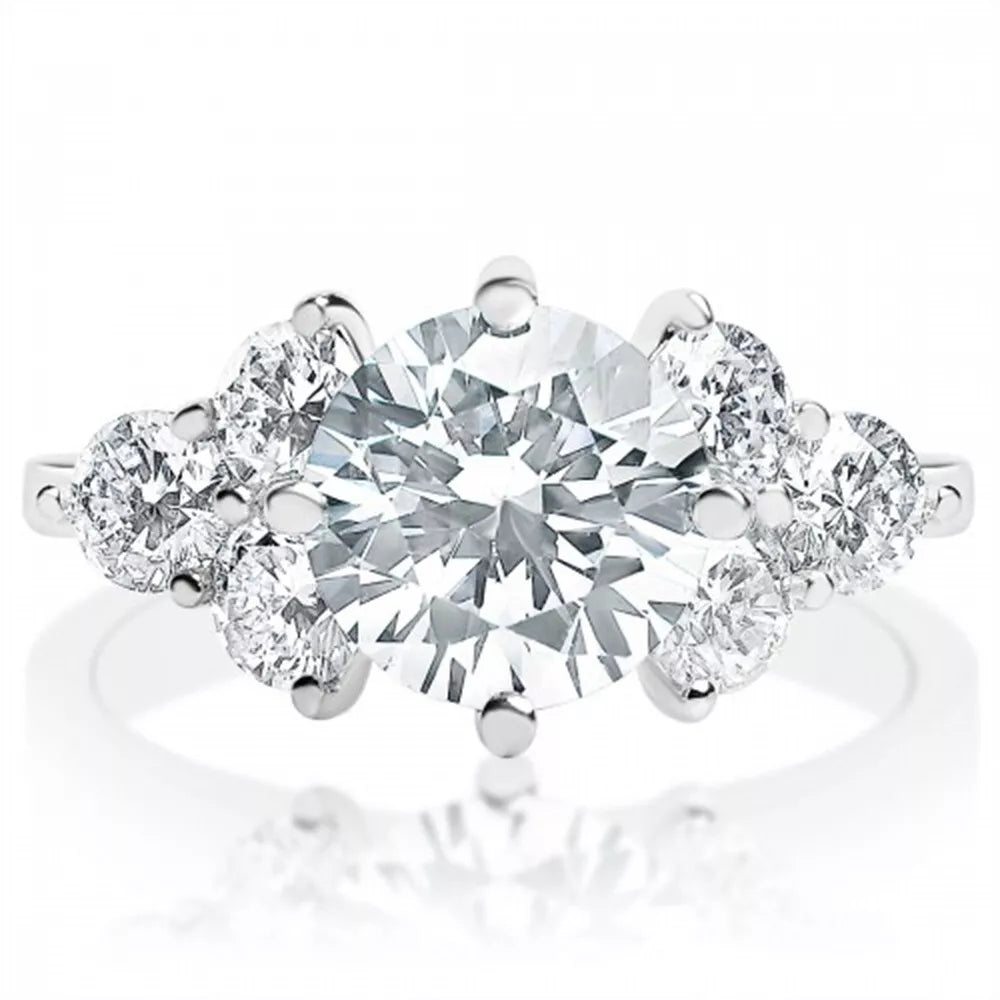 Lab grown diamond engagement ring with round brilliant center stone and side diamonds set in white gold