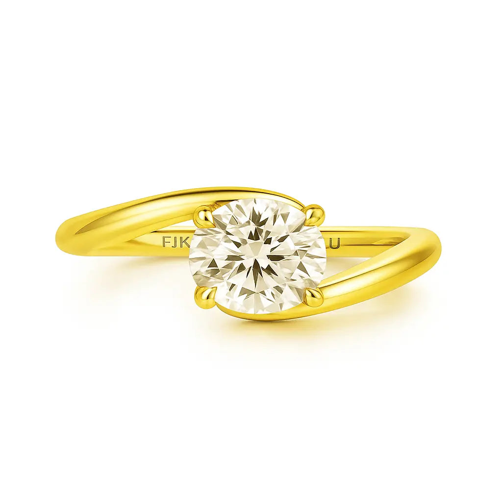Gold ring with a diamond on a white background