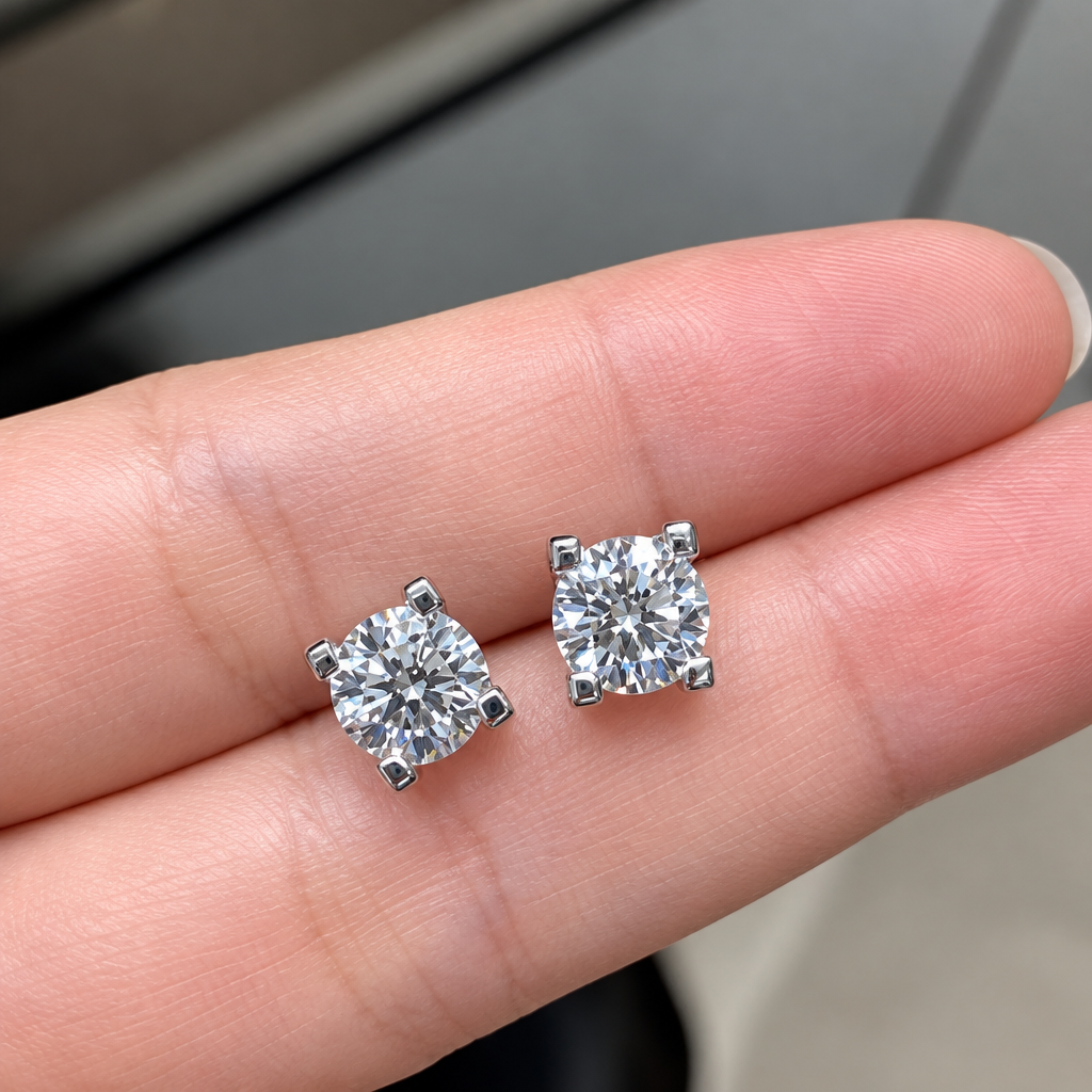 2 Carat Lab Grown Diamond Stud Earrings in 18K White Gold held in hand - Future Jewelry