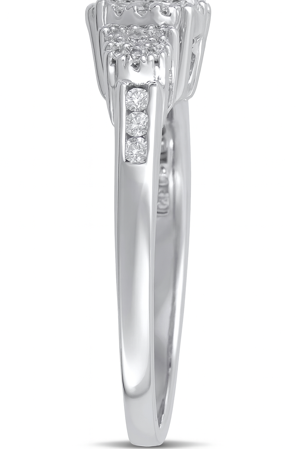 Silver ring with small diamonds on a white background