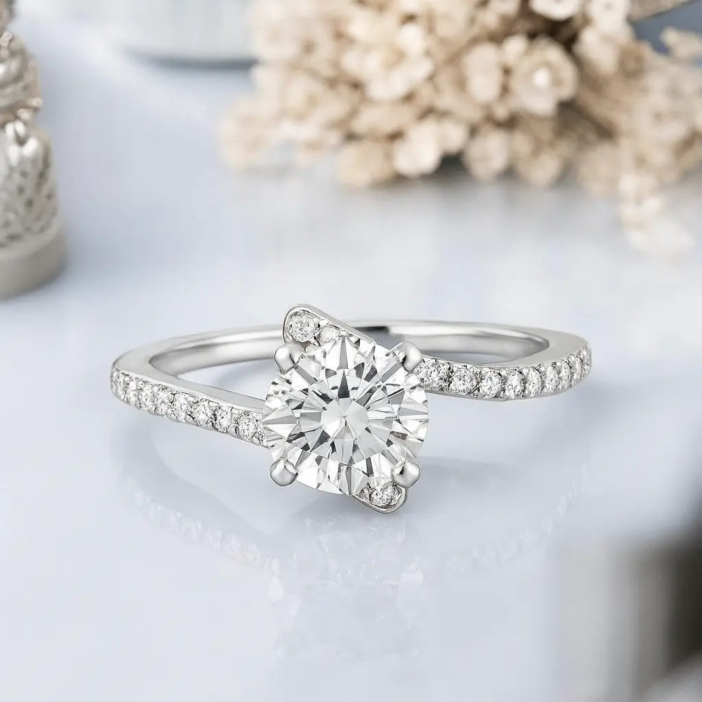 White gold ring with a heart-shaped diamond on a light background