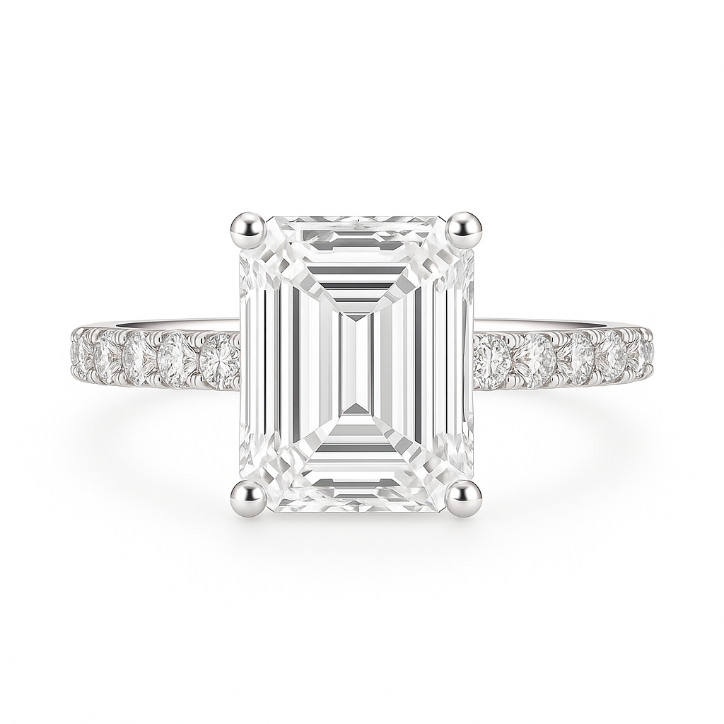 Diamond ring with emerald-cut center stone and smaller diamonds on a white background