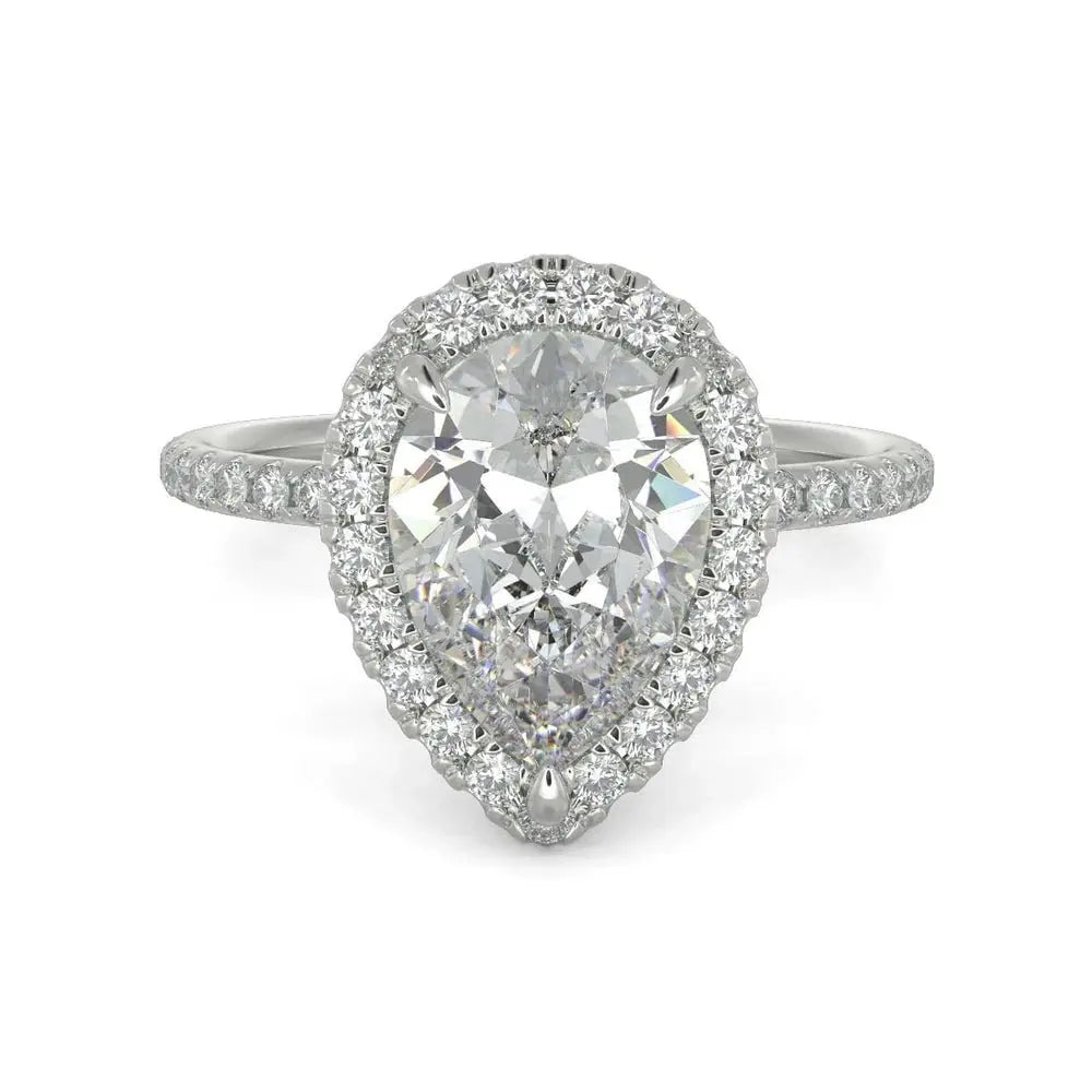 3 Carat Pear Cut Diamond Ring in a white background 