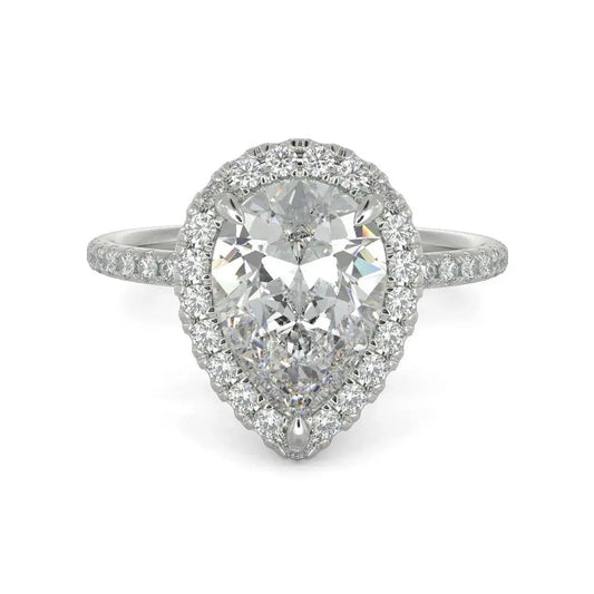 3 Carat Pear Cut Diamond Ring in a white background 