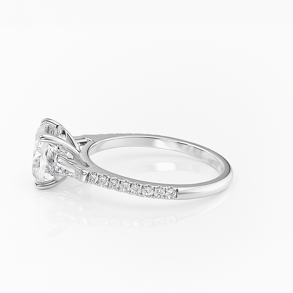 Diamond ring with a white gemstone on a light gray background