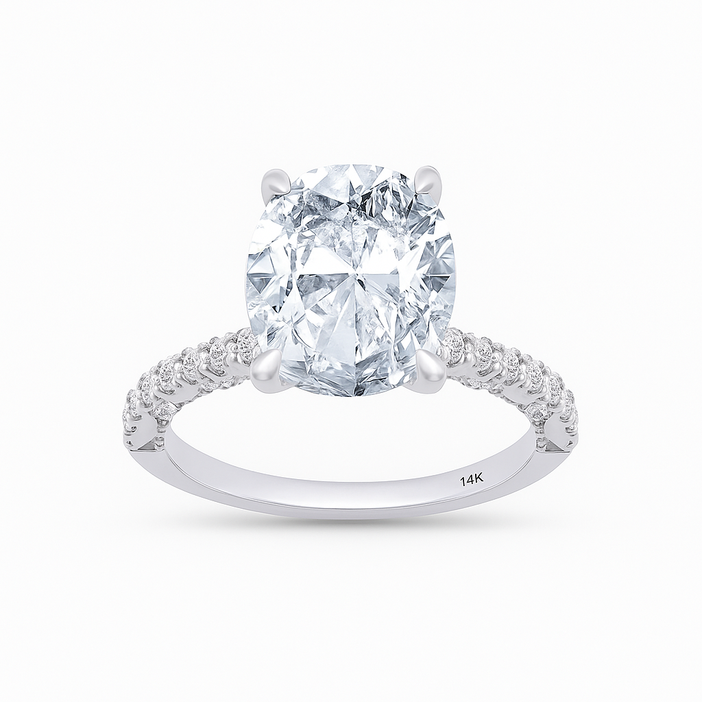 Diamond ring with a large central gemstone and smaller stones on the band against a white background