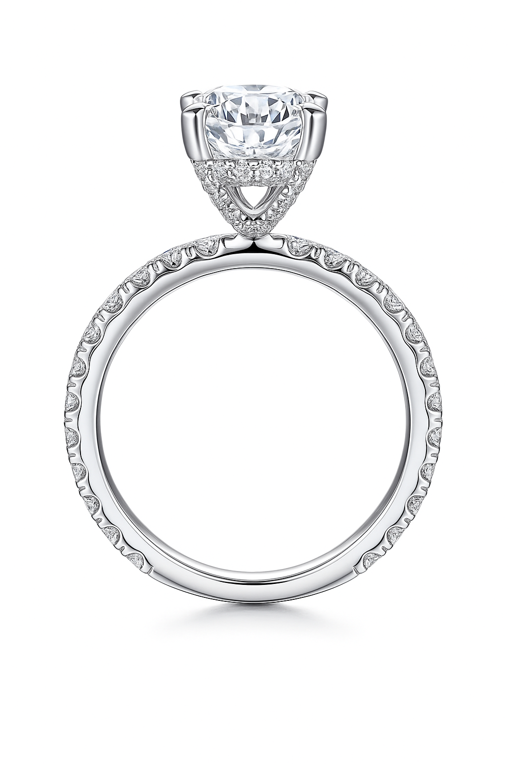 Silver ring with a large diamond and smaller diamonds on the band against a white background