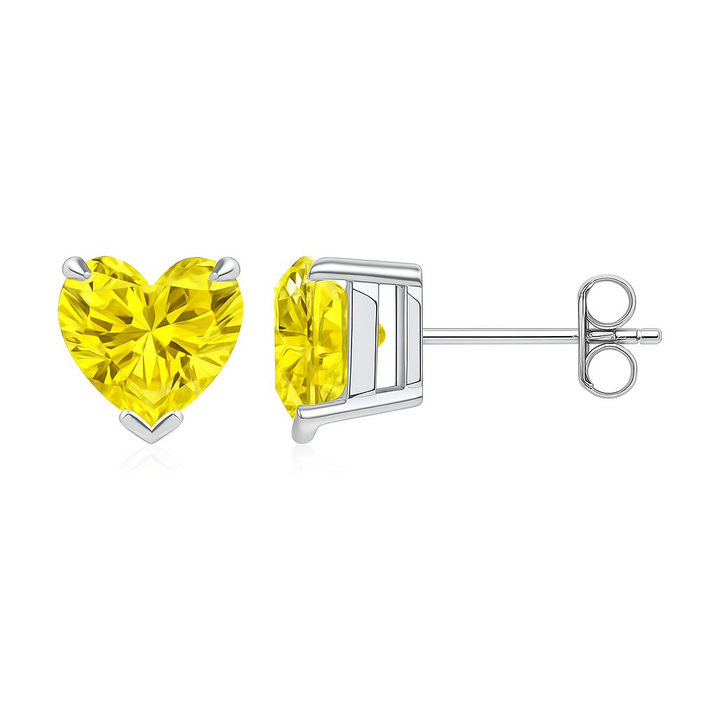 Heart-shaped yellow gemstone earrings on a white background
