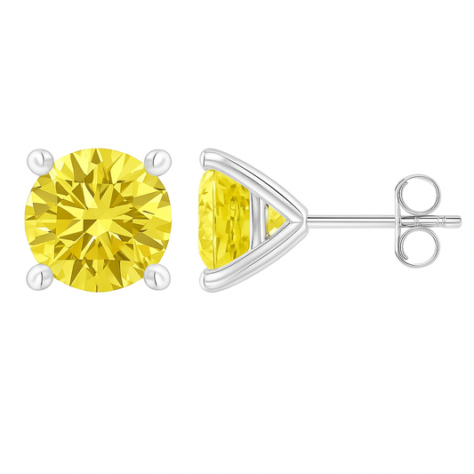 Yellow gemstone stud earrings on a white background
