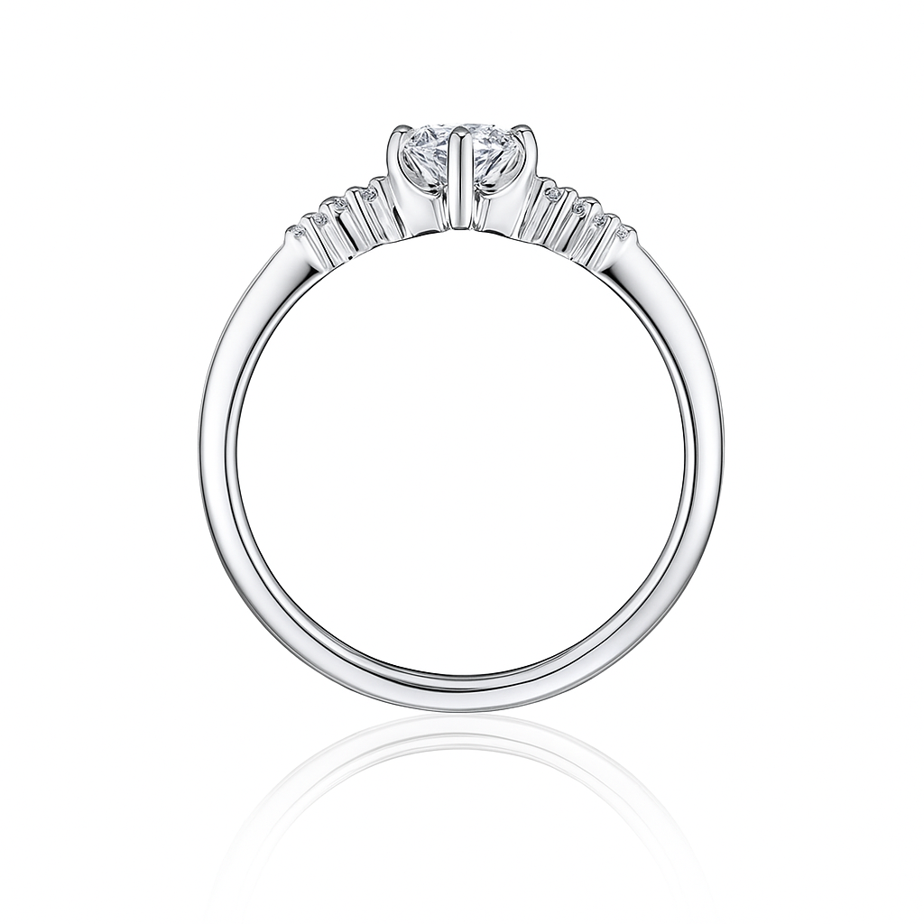 Diamond ring with a central diamond and smaller stones on a white background