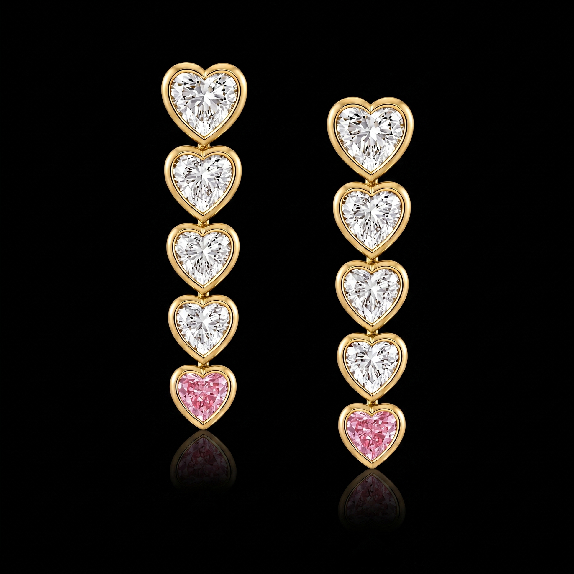 Heart-shaped lab grown diamond drop earrings in 14K yellow gold with fancy pink diamond accents on a black background by Future Jewelry