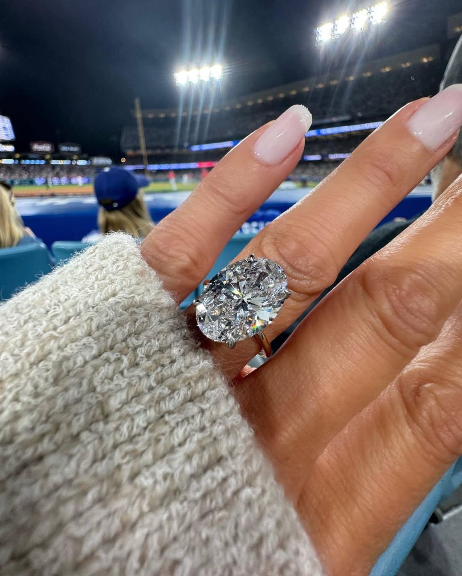 Lab diamond jewelry oval diamond ring worn on hand in real life setting