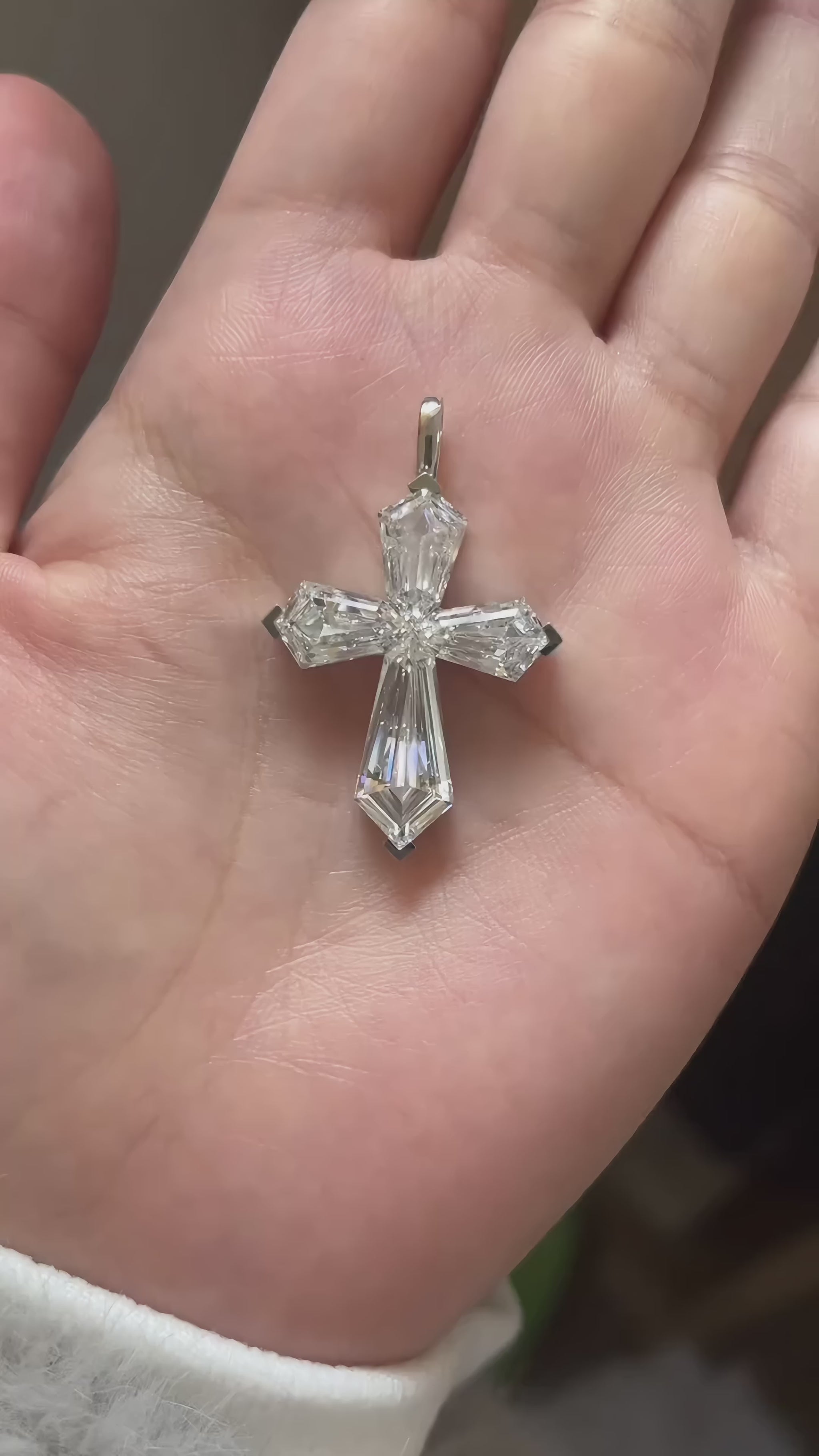 Lab grown diamond cross pendant in white and pink diamonds, video