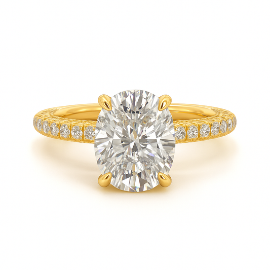 Gold ring with a large diamond and smaller diamonds on the band against a white background