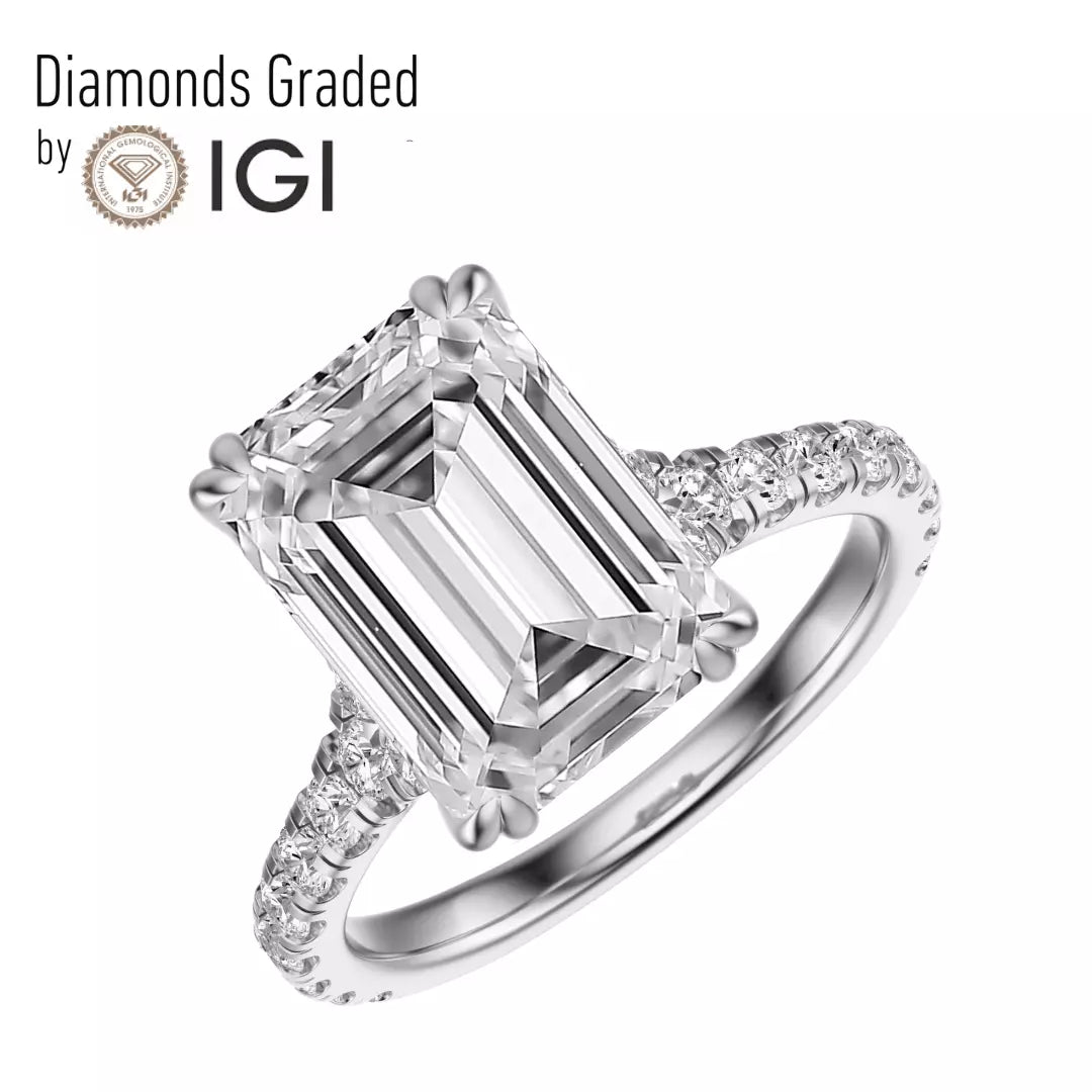 Lab grown diamond engagement ring with 4.50 carat emerald cut center in 14K white gold. F VS2 clarity makes it bold, refined, and radiant.