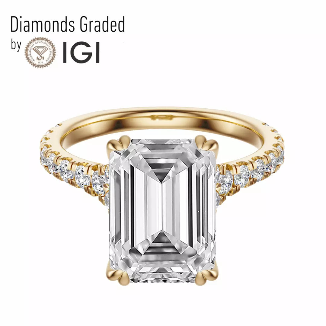 4.50 carat lab grown diamond engagement ring in 14K yellow gold. F VS2 emerald cut delivers clarity and elegance in every glance.