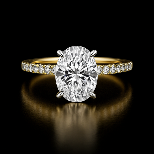 Gold ring with a large diamond and smaller diamonds on the band against a black background